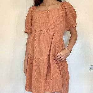 All in Favor Peachy Baby Doll dress